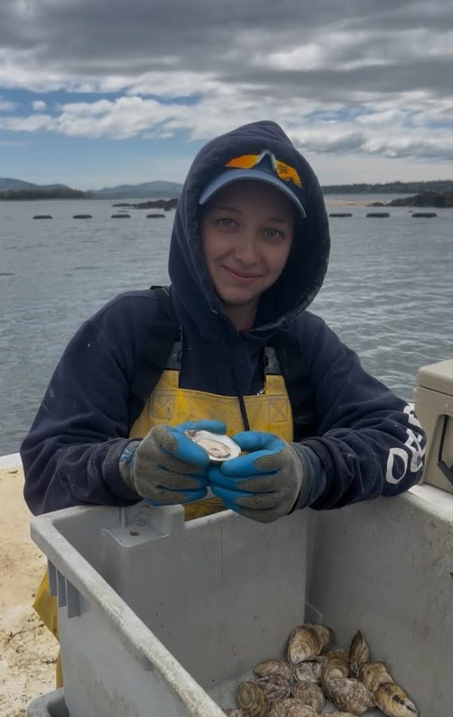 Dylan trying an oyster