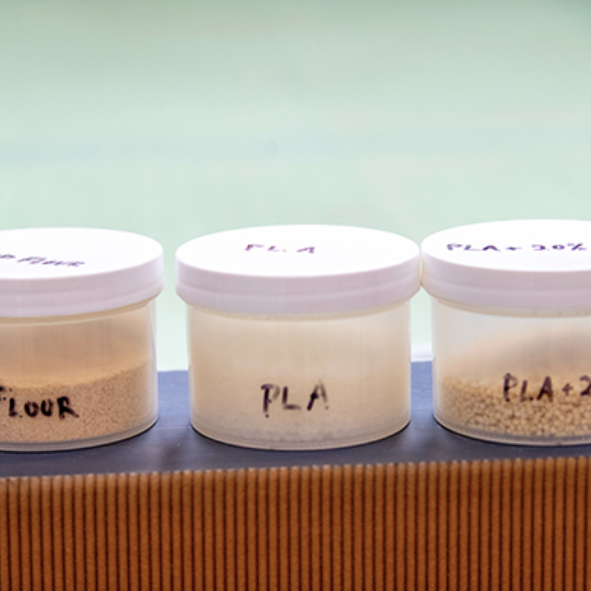 A photo of three containers